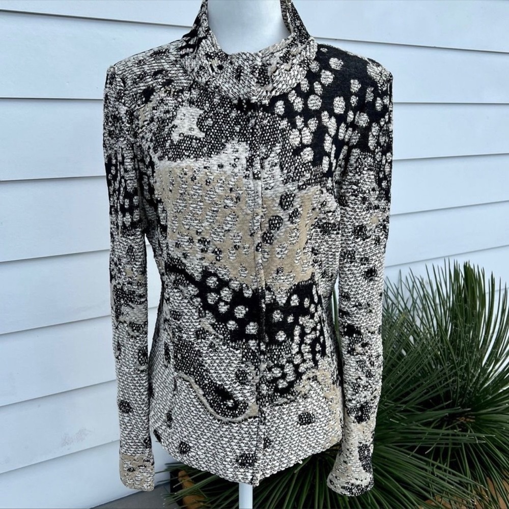 Beautiful St. John’s Jacket / pairs beautifully with a cream or black skirt.